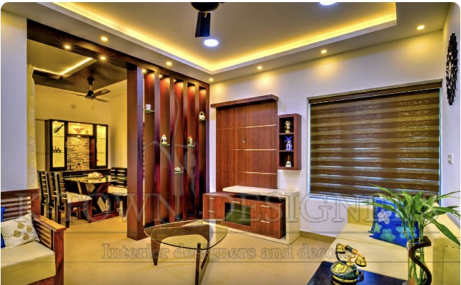 Living room with TV unit and wooden partition, Trivandrum